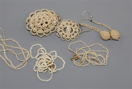 Two early 20th century seed pearl cluster brooches, a pair of seed pearl drop earrings and three seed pearl necklaces.
